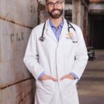 A Gay Male Physician Standing
